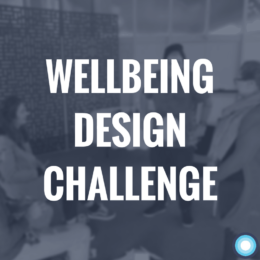Image of people using craft materials to make a first prototype, for a wellbeing design challenge